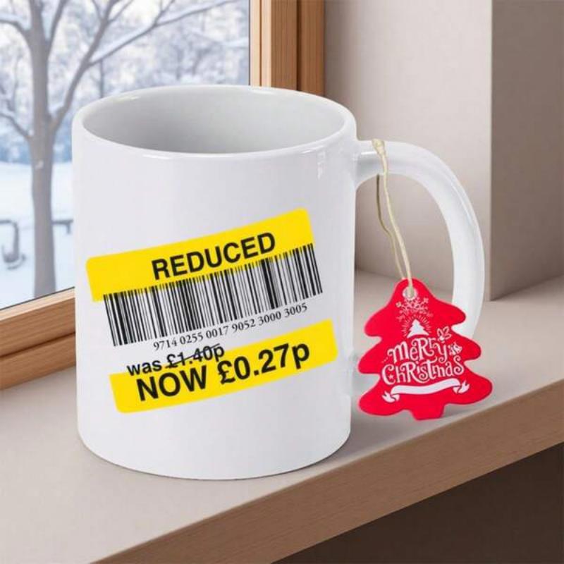 Tailorly White Ceramic 11 oz Mug - Reduced Merry Christmas Yellow Clearance Sticker With Barcode And Prices Beside Festive Red Tree Mug