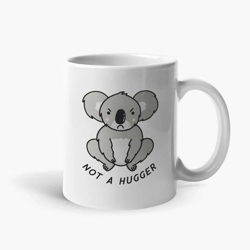 Tailorly White Ceramic 11 oz Mug - Not A Hugger Grumpy Grey Cartoon Animal Sitting Peacefully With Bold Black Text Koala