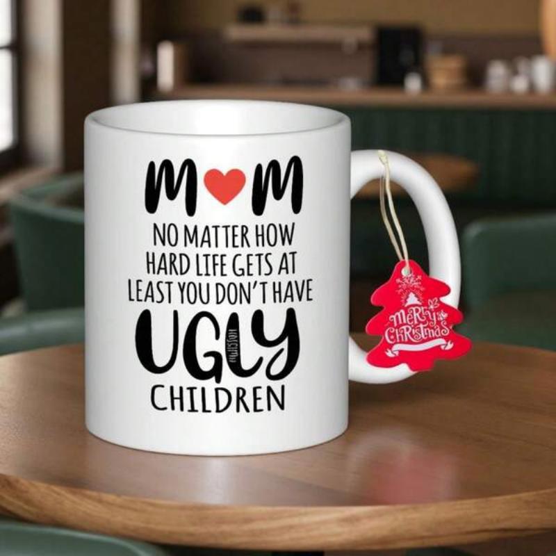 Tailorly White Ceramic 11 oz Mug - Mom No Matter How Hard Life Gets At Least You Don't Have Ugly Children White Ceramic Vessel Featuring Black Stylized Text And
