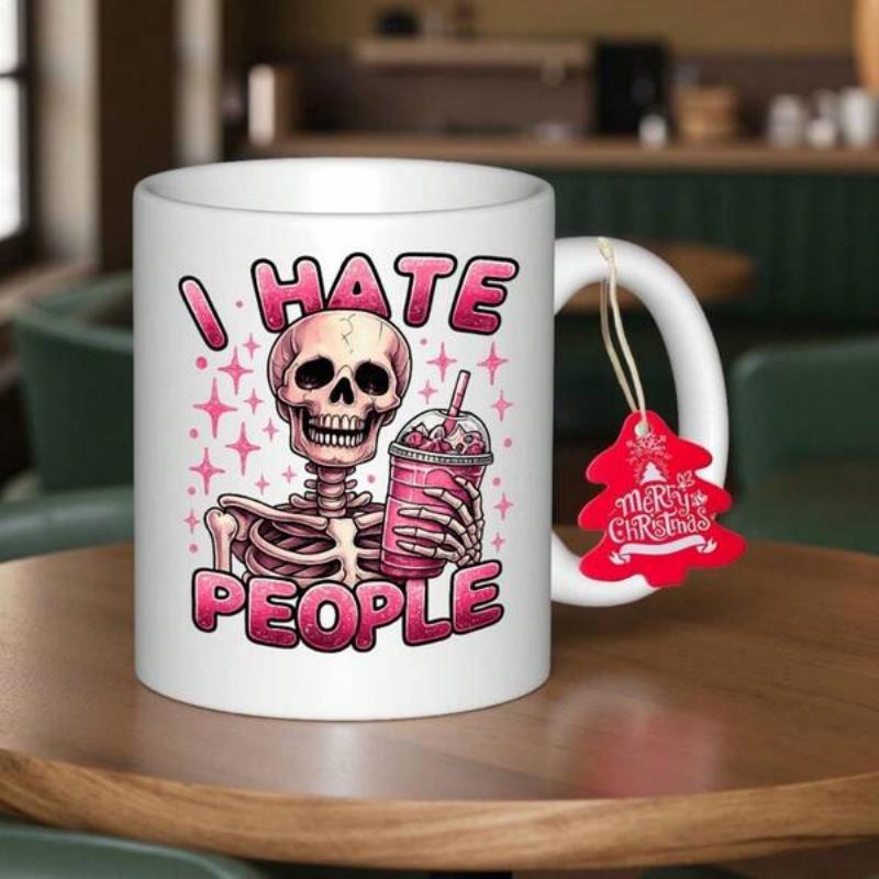 Tailorly White Ceramic 11 oz Mug - I Hate People Pinkish Sparkling Background With Cold Beverage Held By Grinning Skeleton