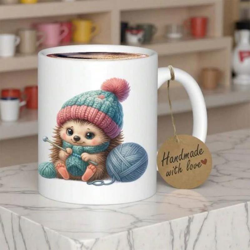 Tailorly White Ceramic 11 oz Mug - Handmade With Love Cute Tiny Creature Wearing Pink Knitted Hat Sitting Beside Blue Yarn Ball Hedgehog