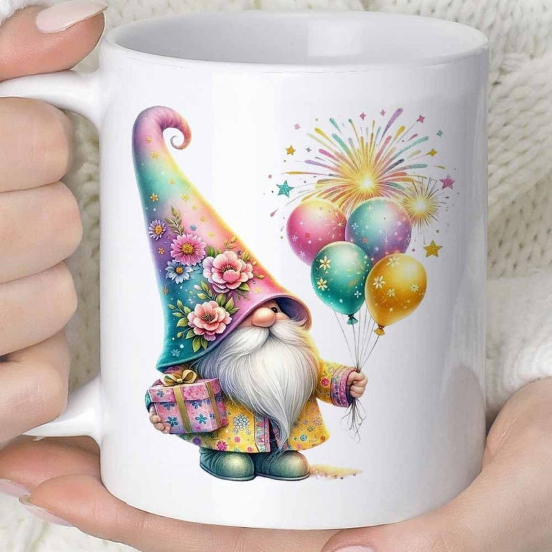 Tailorly White Ceramic 11 oz Mug - Colorful Floral Hat Holding Gift Box And Celebration Balloons Gnome