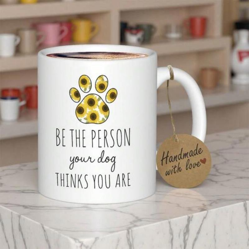 Tailorly White Ceramic 11 oz Mug - Be The Person Your Dog Thinks You Are Vibrant Sunflowers Patterned Inside A Golden Pet Dog Paw