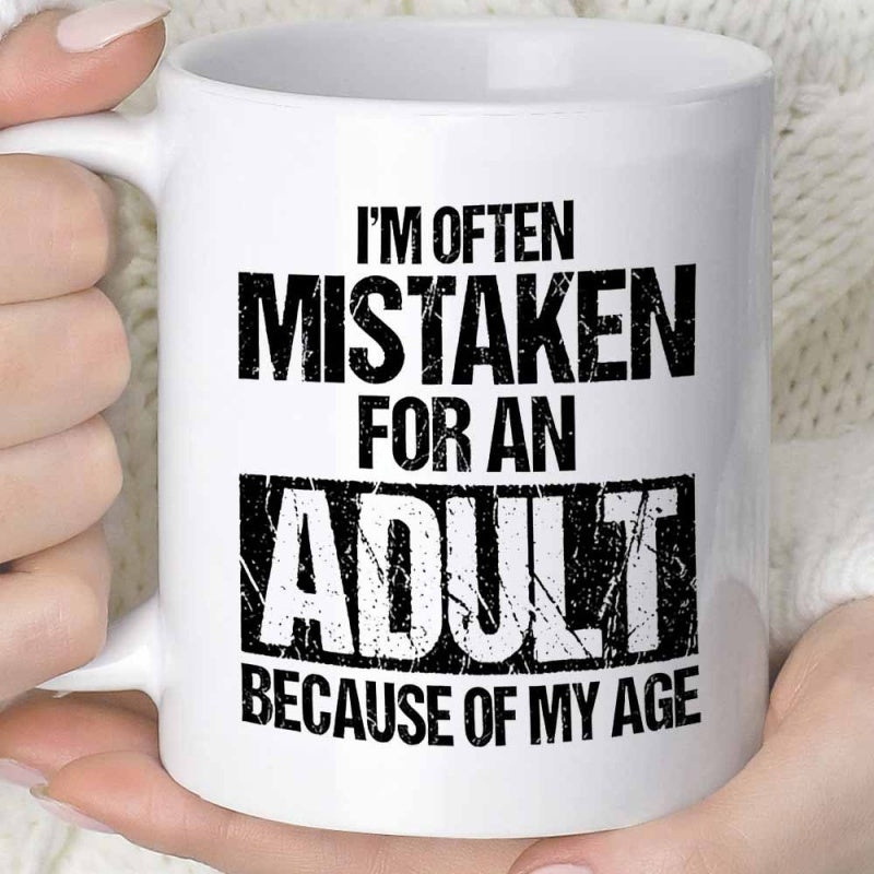 Tailorly White Ceramic 11 oz Mug - Im Often Mistaken For An Adult Because Of My Age Distressed Bold Black Lettering Printed Upon A Smooth Ceramic Surface