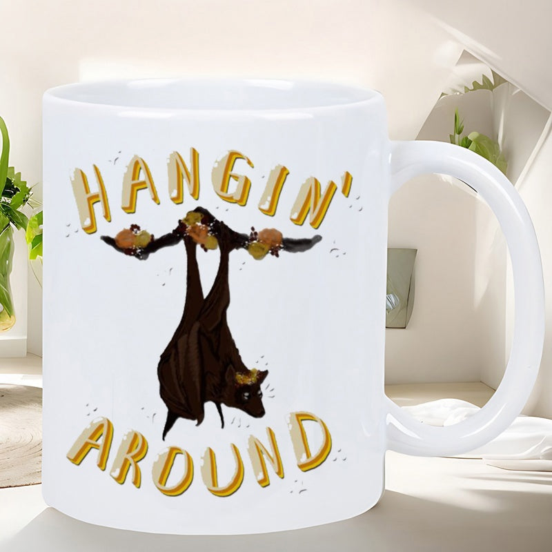 Tailorly White Ceramic 11 oz Mug - Hangin Around Stylized Brown Nocturnal Creature Hanging Upside Down With Playful Golden Lettering Bat