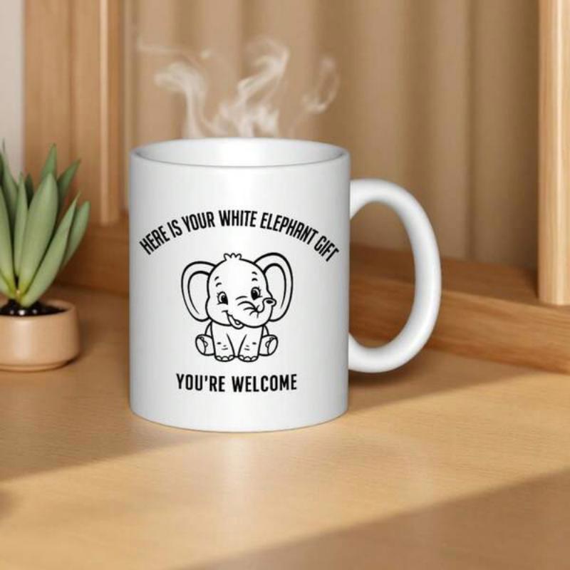 Tailorly White Ceramic 11 oz Mug - Here Is Your White Elephant Gift Youre Welcome Adorable Sitting Baby Elephant With Large Ears And Simple Line Art Elephant