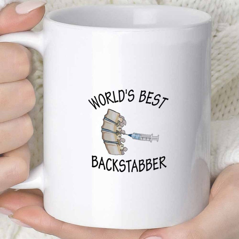 Tailorly White Ceramic 11 oz Mug - Worlds Best Backstabber Anatomical Human Vertebrae With A Blue Medical Liquid Syringe Spine