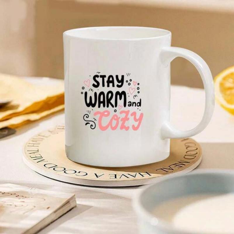 Tailorly White Ceramic 11 oz Mug - Stay Warm And Cozy Minimalist White Ceramic Vessel Featuring Playful Handwritten Script And Decorative Swirls Mug