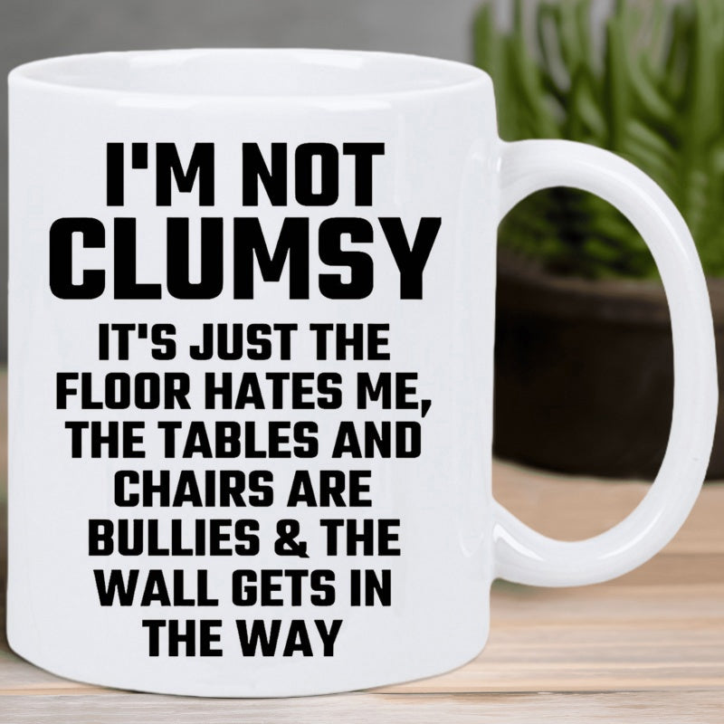 Tailorly White Ceramic 11 oz Mug - Im Not Clumsy It Is Just The Floor Hates Me The Tables And Chairs Are Bullies And The Wall Gets In The Way Bold Minimalist Black