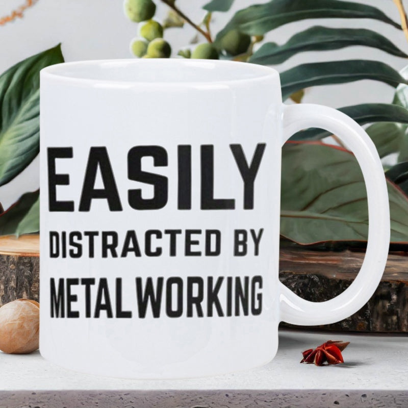 Tailorly White Ceramic 11 oz Mug - Easily Distracted By Metalworking Simple Minimalist White Ceramic Vessel With Bold Black Typography Design Mug