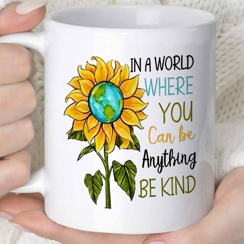 Tailorly White Ceramic 11 oz Mug - In A World Where You Can Be Anything Be Kind Vibrant Yellow Petals Embracing A Detailed Blue Green Earth Globe Sunflower