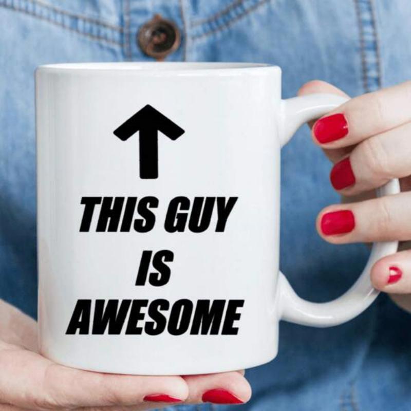 Tailorly White Ceramic 11 oz Mug - This Guy Is Awesome Bold Black Minimalist Directional Pointer Symbol Centered On White Background Arrow