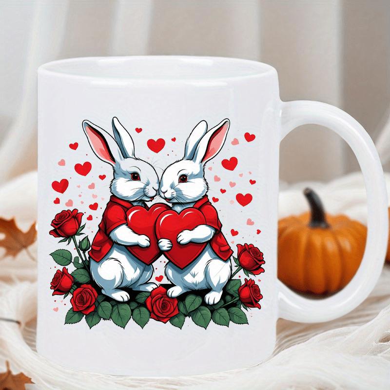 Tailorly White Ceramic 11 oz Mug - Charming White Pair Holding Red Hearts Among Elegant Blooming Rose Flowers Bunnies