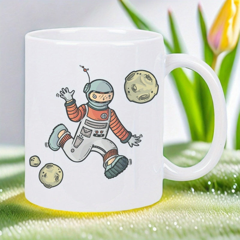Tailorly White Ceramic 11 oz Mug - Playful Cartoon Character Floating Through Space Among Cratering Moon Rocks Astronaut