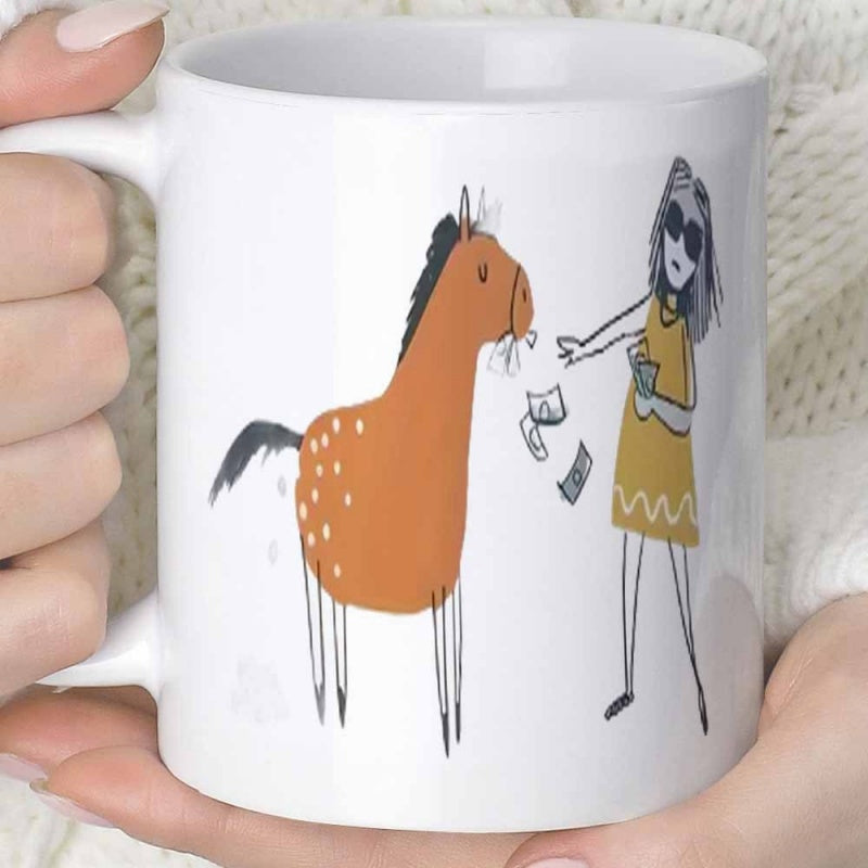 Tailorly White Ceramic 11 oz Mug - Hand Drawn Cartoon Girl Throwing Money Towards A Spotted Brown Horse