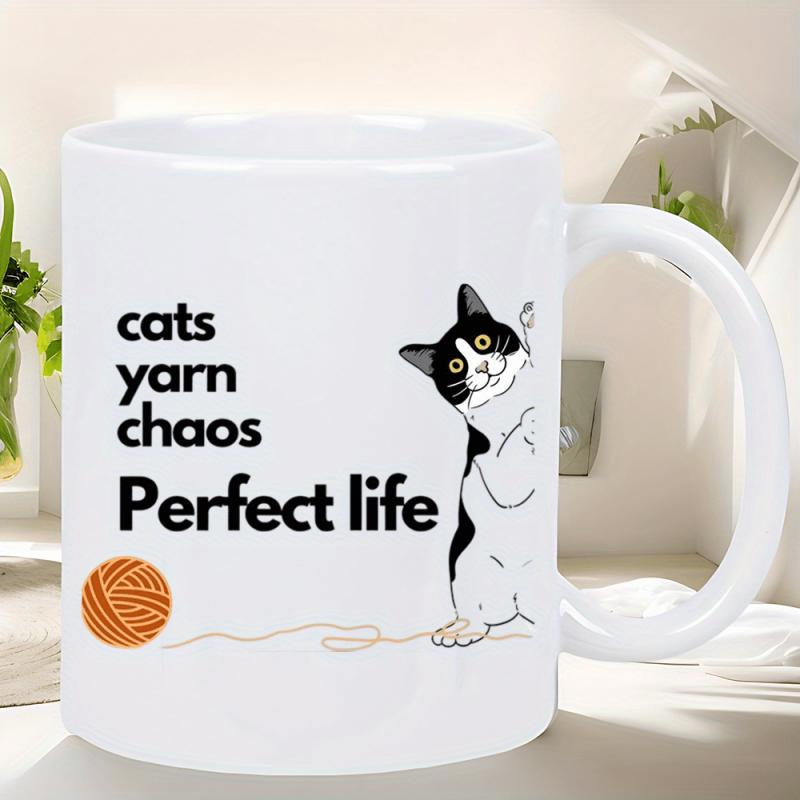 Tailorly White Ceramic 11 oz Mug - Cats Yarn Chaos Perfect Life Playful Tuxedo Kitten Peeking Next To A Small Orange Yarn Ball Cat