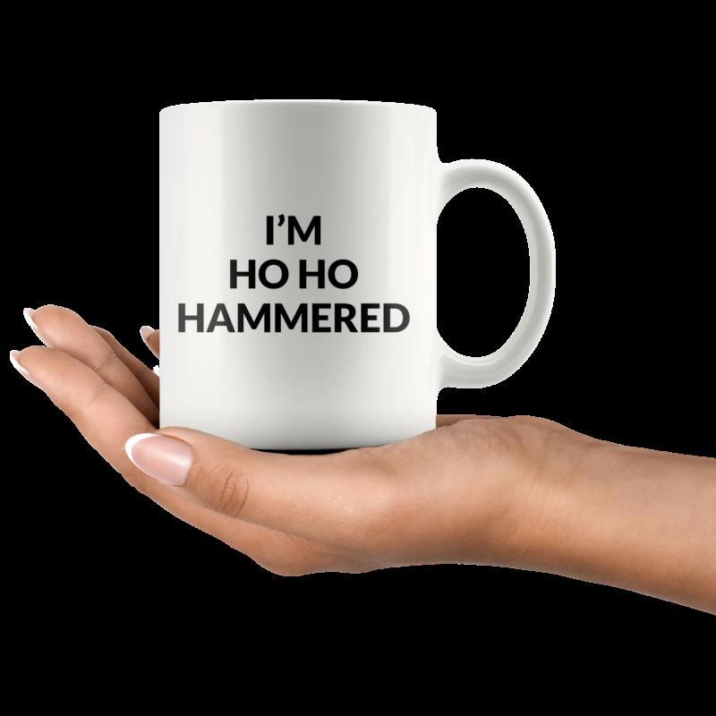 Tailorly White Ceramic 11 oz Mug - I'm Ho Ho Hammered Minimalist Ceramic Vessel Held Gently In A Palm Against Dark Backdrop Mug