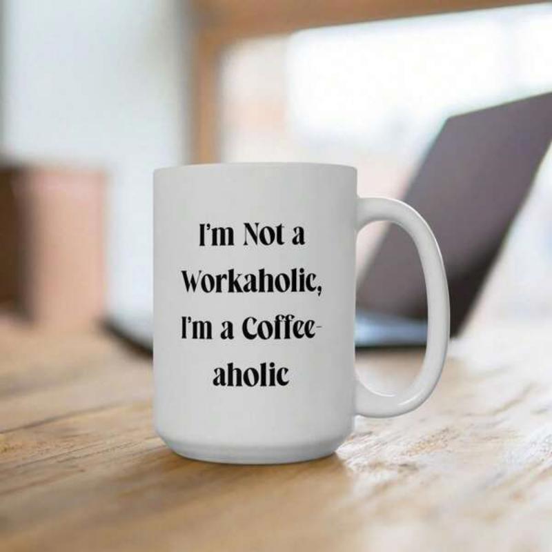 Tailorly White Ceramic 11 oz Mug - Im Not A Workaholic Im A Coffee Aholic Clean Resting Gracefully On Rustic Wooden Table Background Mug