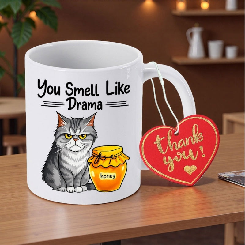 Tailorly White Ceramic 11 oz Mug - You Smell Like Drama Grumpy Fluffy Grey Feline Sitting Beside A Small Golden Honey Jar Cat