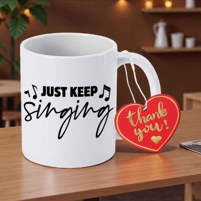 Tailorly White Ceramic 11 oz Mug - Just Keep Singing Simple Black Musical Notes Floating Around Handwritten Script Decorative Text Mug