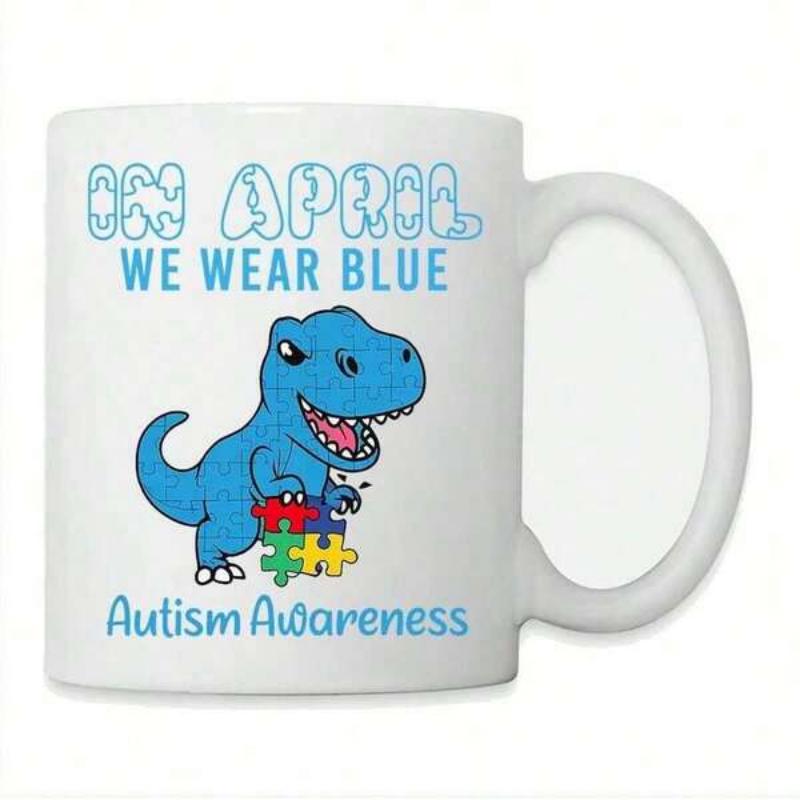 Tailorly White Ceramic 11 oz Mug - In April We Wear Blue Autism Awareness Cute Blue Cartoon Tyrannosaurus Rex Holding Colorful Jigsaw Pieces For Awareness Dinosaur
