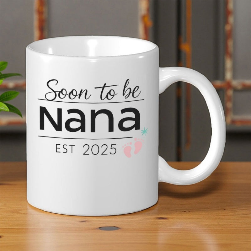 Tailorly White Ceramic 11 oz Mug - Soon To Be Nana Est 2025 Elegant Minimalist Ceramic Surface With Tiny Pink Blue Baby Footprints