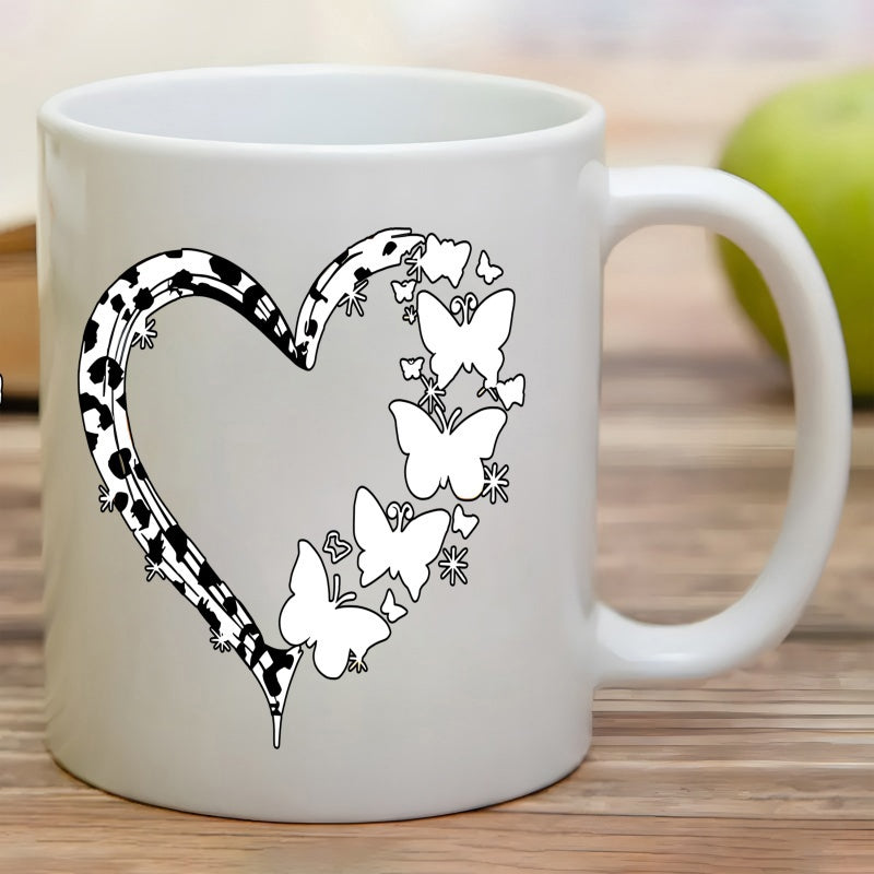 Tailorly White Ceramic 11 oz Mug - Graceful Butterfly Flight Forming Half Heart With Leopard Print Texture Heart