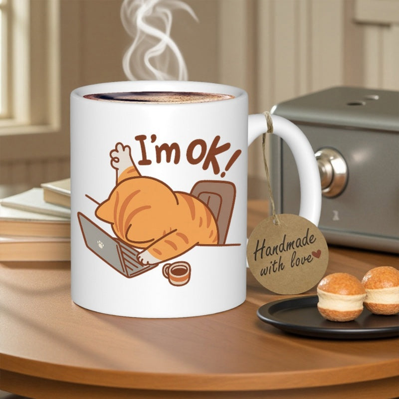 Tailorly White Ceramic 11 oz Mug - Im Ok Tired Orange Tabby Resting Over A Laptop On A Wooden Office Desk Cat
