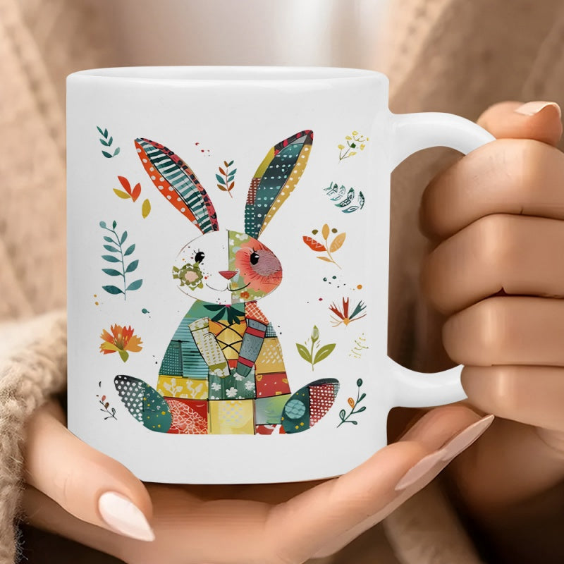Tailorly White Ceramic 11 oz Mug - Artistic Patchwork Design With Colorful Floral Patterns Surrounding A Sitting Folk Rabbit