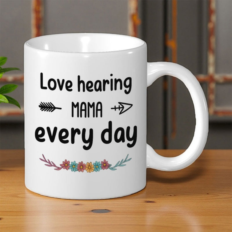 Tailorly White Ceramic 11 oz Mug - Love Hearing Mama Every Day Stylized Black Arrows Flanking Text Above A Delicate Colorful Floral Vine Mug