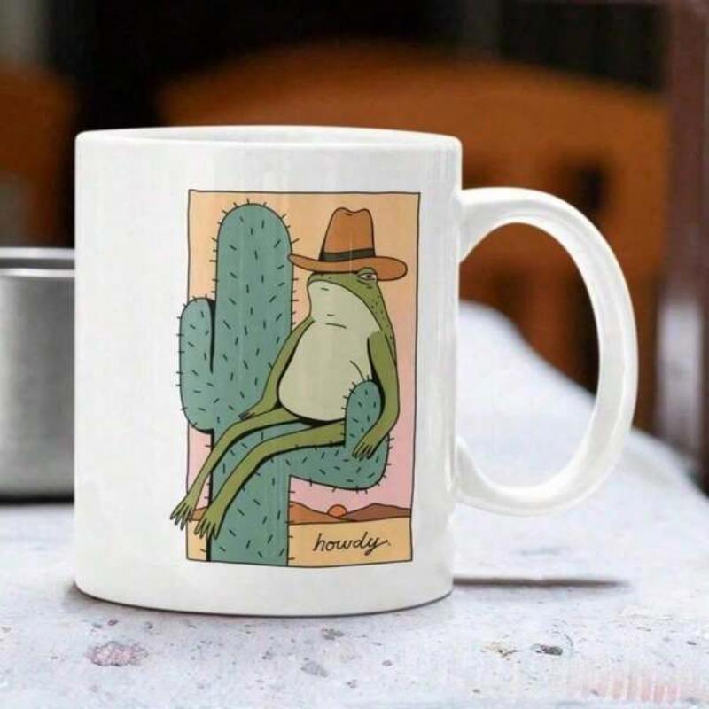 Tailorly White Ceramic 11 oz Mug - Howdy Charming Green Frog Wearing Cowboy Hat Sitting On Prickly Cactus Frog