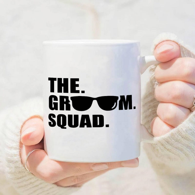 Tailorly White Ceramic 11 oz Mug - The Groom Squad Minimalist Black Sunglasses Symbol Integrated Within Bold Stacked Modern Typography Mug