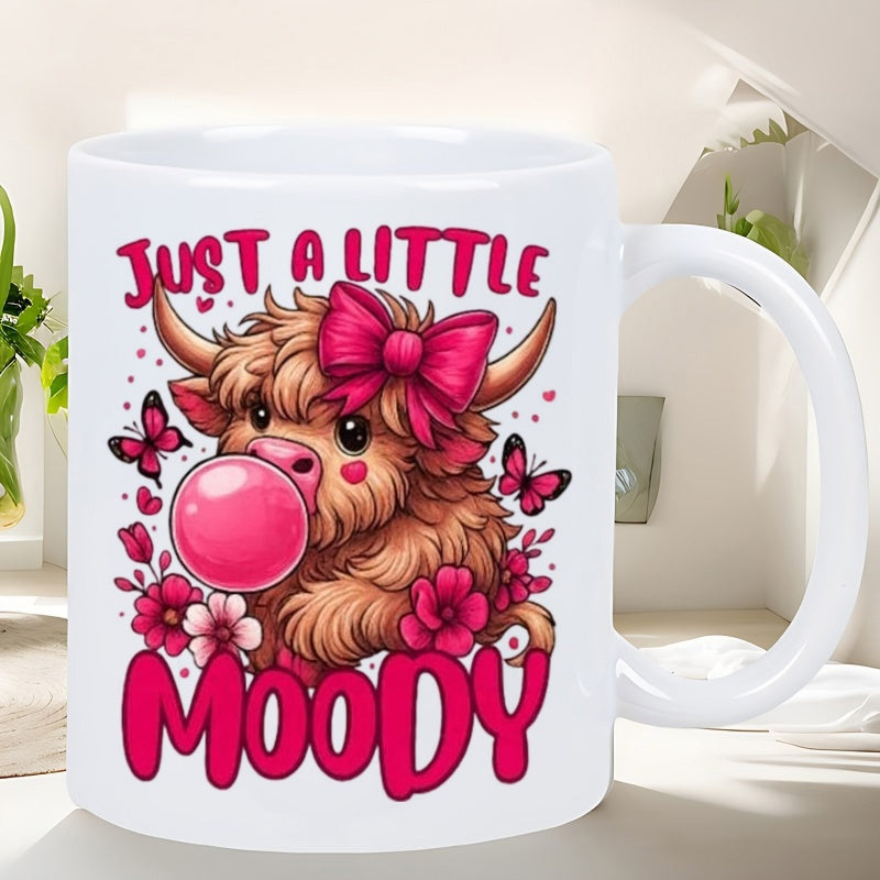 Tailorly White Ceramic 11 oz Mug - Just A Little Moody Adorable Highland Cow Blowing Pink Bubble Gum Amidst Flowers And Butterflies Highland Cow
