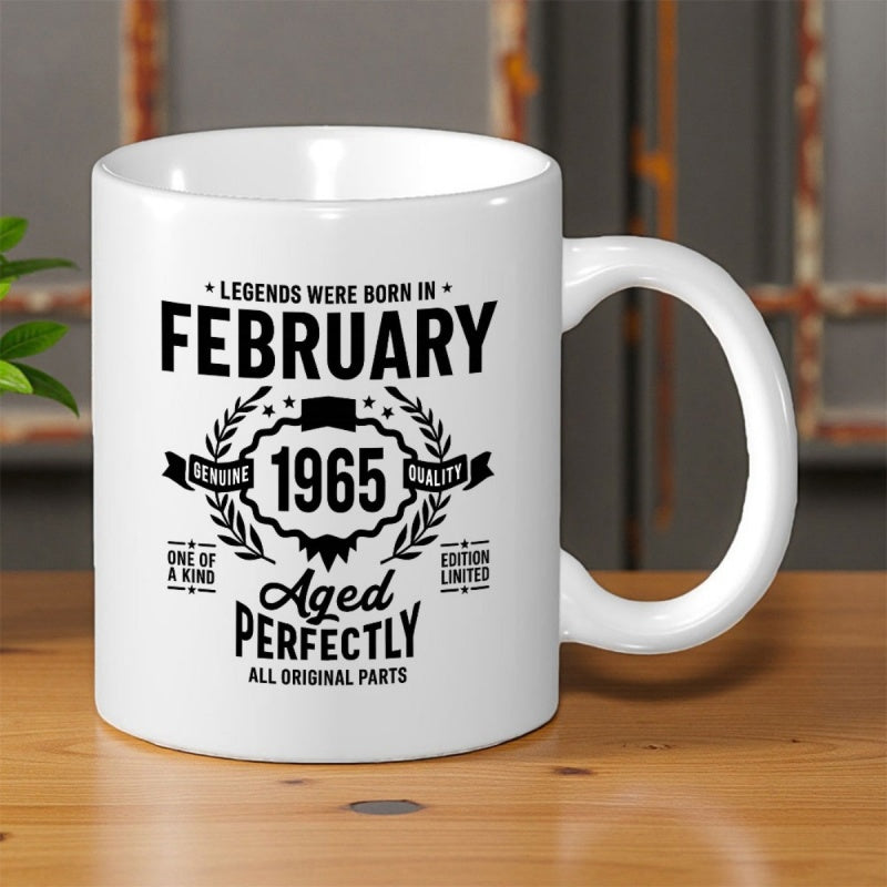 Tailorly White Ceramic 11 oz Mug - Legends Were Born In February 1965 Aged Perfectly Vintage Circular Badge With Intricate Laurel Wreath And Decorative Frame Mug