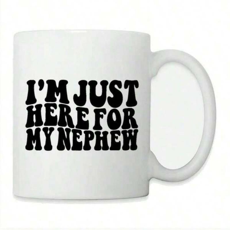 Tailorly White Ceramic 11 oz Mug - Im Just Here For My Nephew Retro Wavy Black Lettering Displayed On A Classic