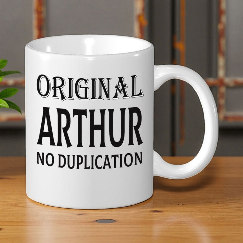 Tailorly White Ceramic 11 oz Mug - Original Arthur No Duplication Minimalist White Ceramic Coffee Cup Resting On A Polished Wooden Table Mug