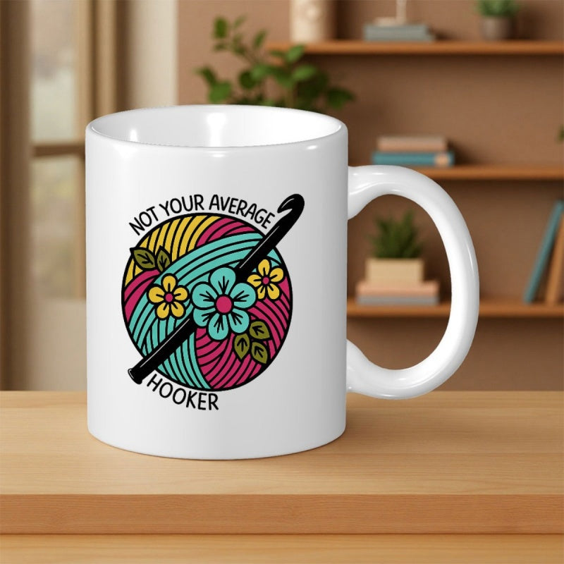 Tailorly White Ceramic 11 oz Mug - Not Your Average Hooker Colorful Yarn Ball With Crochet Hook Among Small Blooming Flowers Mug
