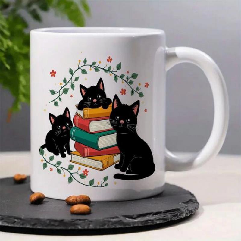 Tailorly White Ceramic 11 oz Mug - Three Curious Black Cats Sitting Around Colorful Books Within Floral Vines Cat