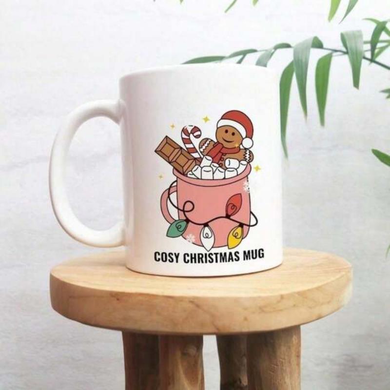 Tailorly White Ceramic 11 oz Mug - Cosy Christmas Mug Cheerful Gingerbread Man Wearing Santa Hat Resting Inside Festive Pink Cup Gingerbread Man