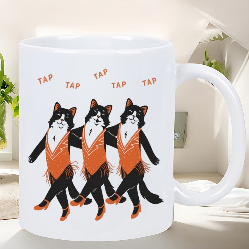 Tailorly White Ceramic 11 oz Mug - Tap Tap Tap Tap Tap Three Tuxedo Cats Performing A Graceful Tap Dance Wearing Orange Costumes Cat