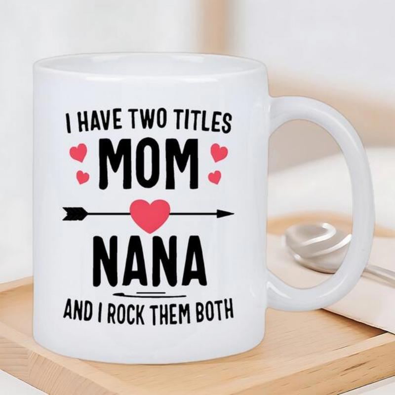 Tailorly White Ceramic 11 oz Mug - I Have Two Titles Mom Nana And I Rock Them Both Elegant Red Hearts Flanking Bold Text With A Central Love Arrow Mug