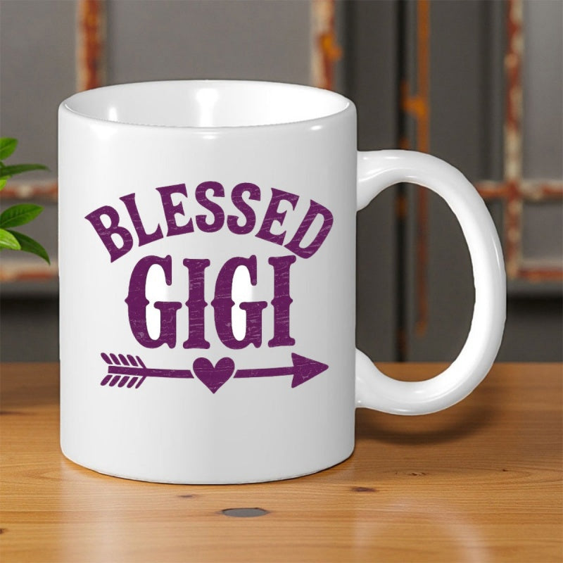 Tailorly White Ceramic 11 oz Mug - Blessed Gigi Purple Arched Lettering With A Heart Centered In A Decorative Arrow Mug