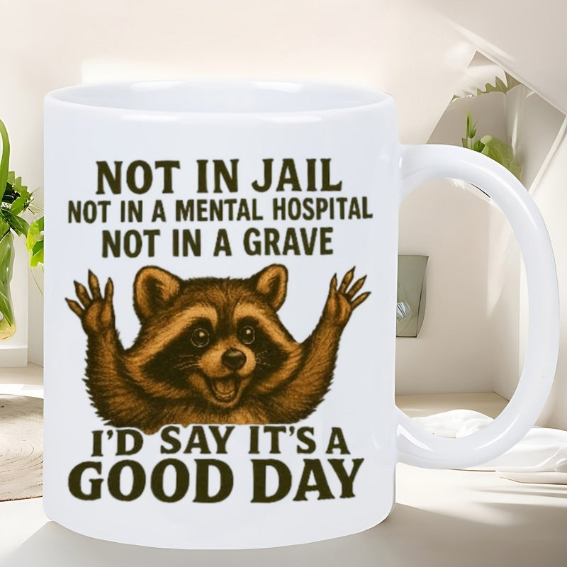 Tailorly White Ceramic 11 oz Mug - Not In Jail Not In A Mental Hospital Not In A Grave Id Say Its A Good Day Happy Brown Raccoon Raising Paws Among Bold Humorous