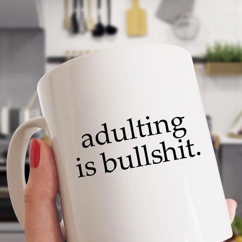 Tailorly White Ceramic 11 oz Mug - Adulting Is Bullshit Simple Minimalist White Ceramic Vessel Featuring Bold Black Serif Typography Mug
