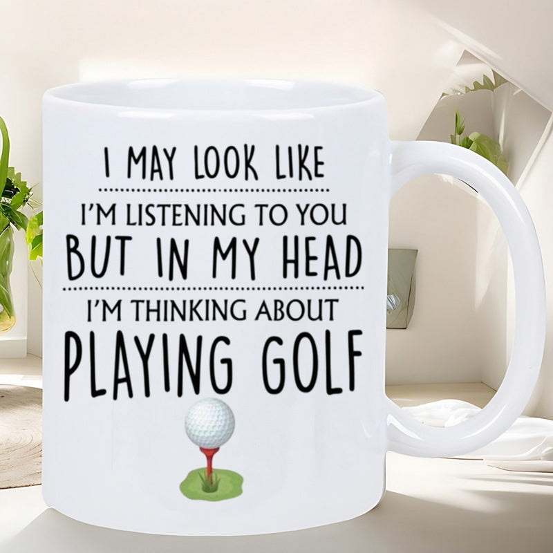 Tailorly White Ceramic 11 oz Mug - I May Look Like Im Listening To You But In My Head Im Thinking About Playing Golf Small White Dimpled Sphere Resting On A Red