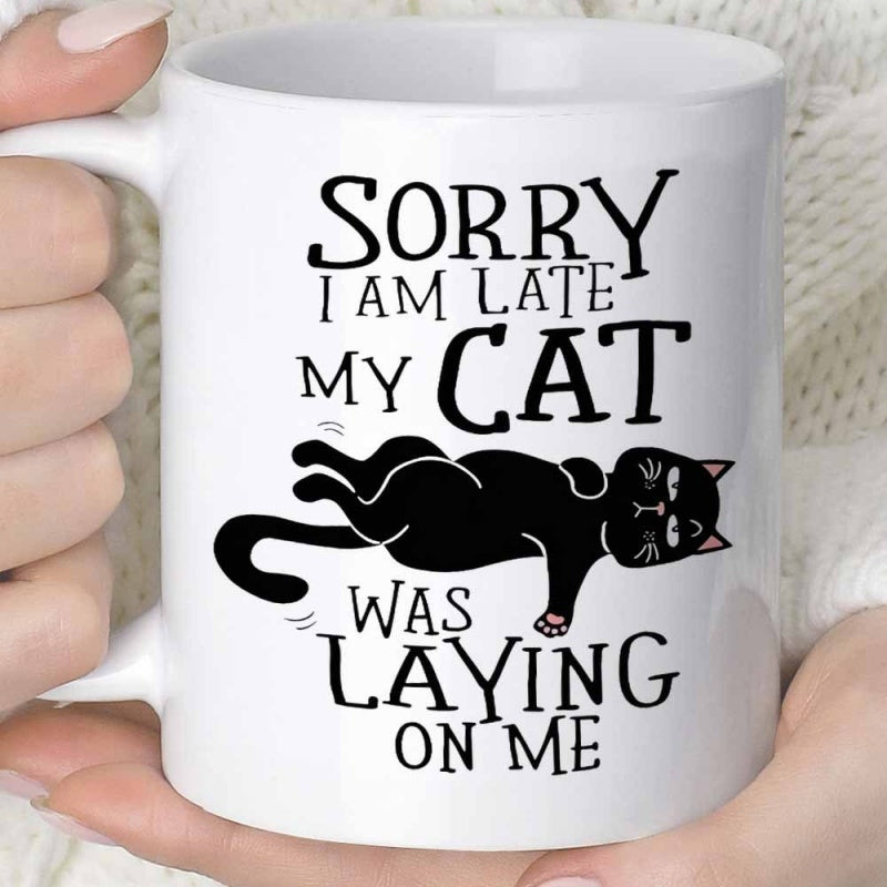 Tailorly White Ceramic 11 oz Mug - Sorry I Am Late My Cat Was Laying On Me Playful Relaxed Black Cartoon Kitten Stretching Across Stylized Decorative Bold