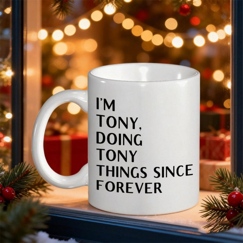 Tailorly White Ceramic 11 oz Mug - Im Tony Doing Tony Things Since Forever Classic White Ceramic Placed Among Festive Christmas Lights And Pine Mug