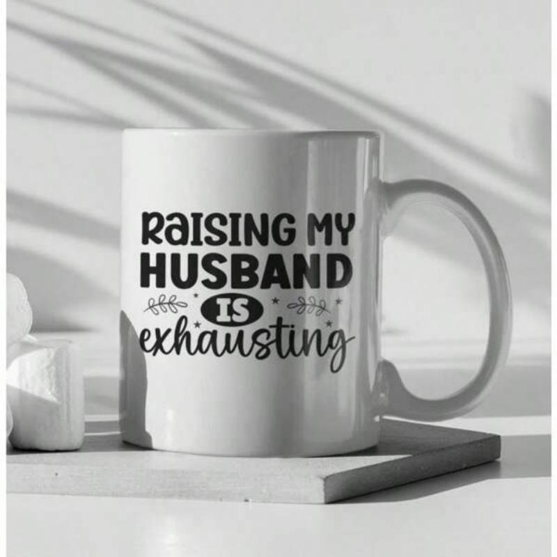 Tailorly White Ceramic 11 oz Mug - Raising My Husband Is Exhausting Minimalist White Background With Bold Black Slogan Typography Style Mug