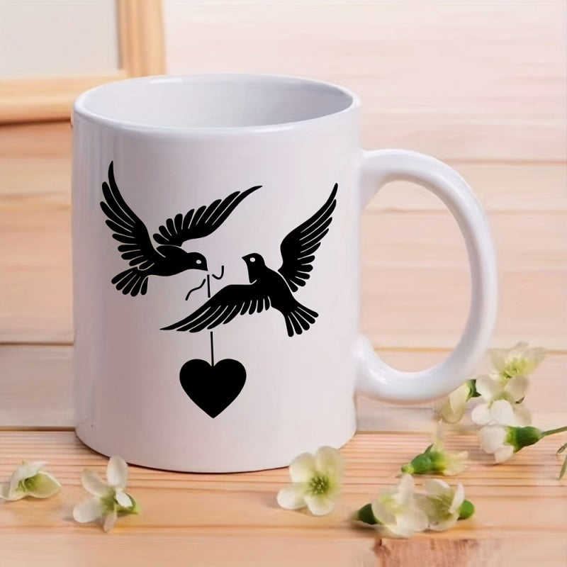 Tailorly White Ceramic 11 oz Mug - Two Elegant Flying Silhouetted Creatures Carrying A Heart Symbolizing Love Birds