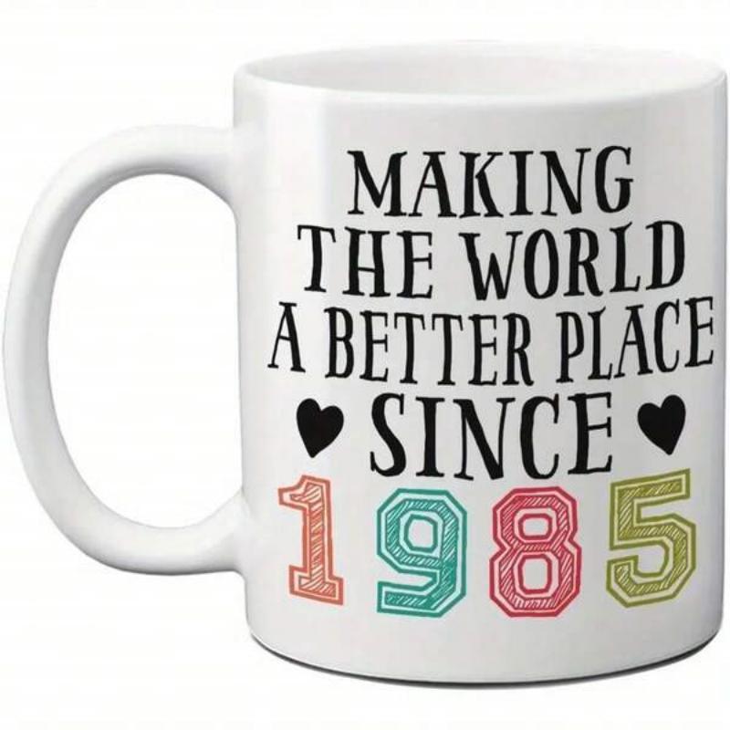 Tailorly White Ceramic 11 oz Mug - Making The World A Better Place Since 1985 Minimalist Hearts Combined With Colorful Textured Vintage Style Numbers Mug